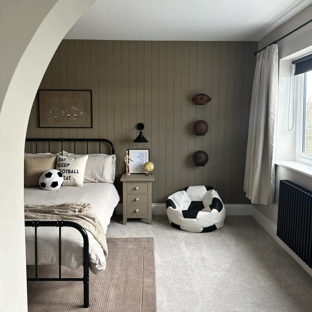 taupe bedroom with football theme. Credit: @final_family_home