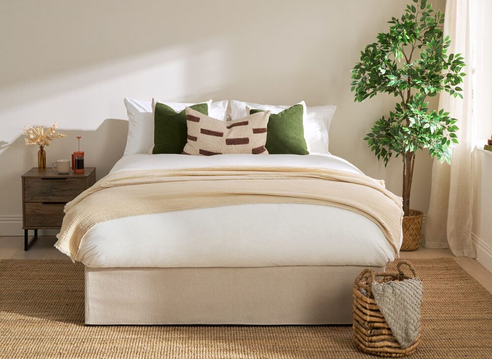Cosmopolitan Quick Build Platform Bed Frame in beige with green earthy accessories
