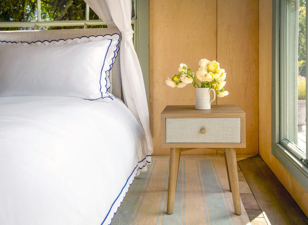 Arbor bedside table with flowers