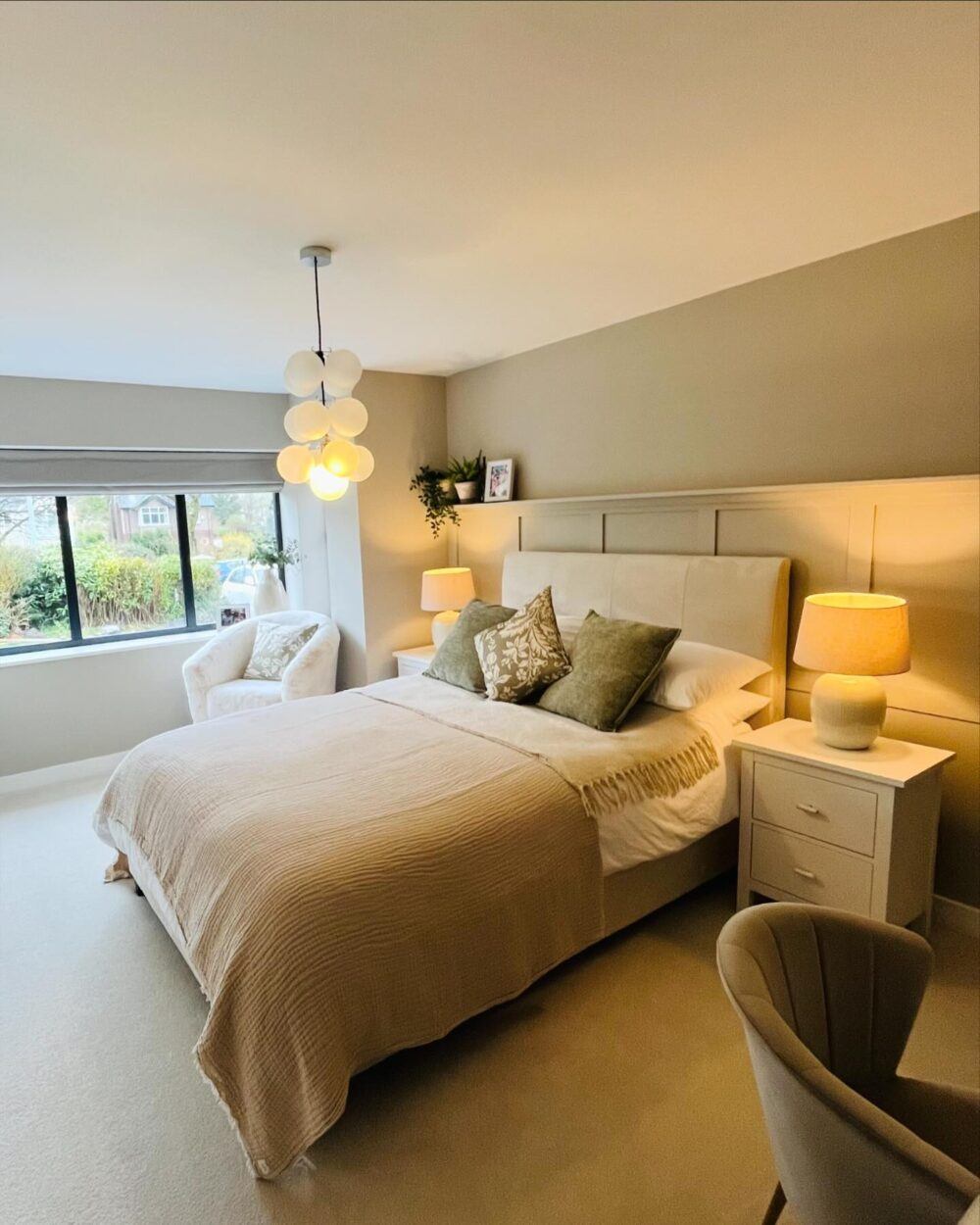 sleigh bed in the centre of a bedroom