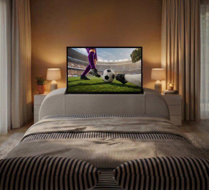 A TV bed showing the football World Cup