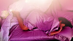 Lady in pink bed