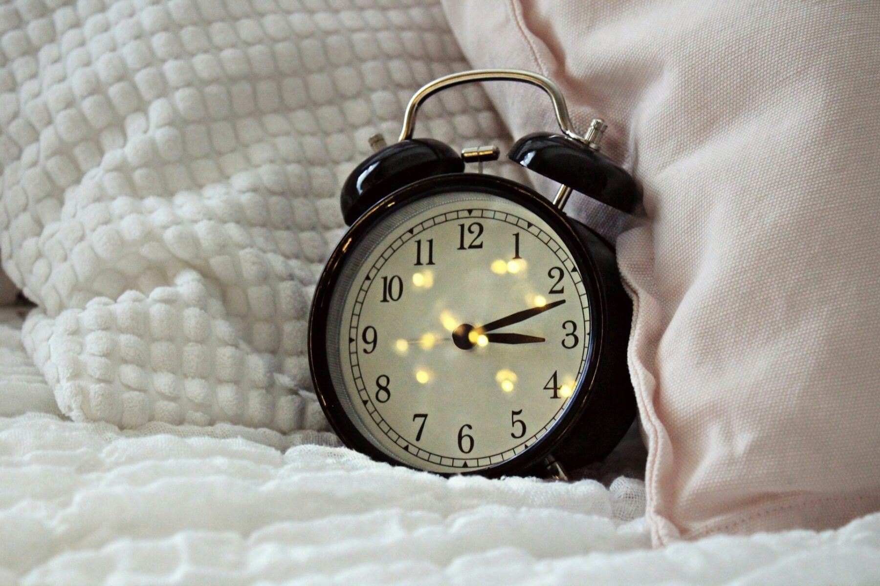 Alarm clock in bed