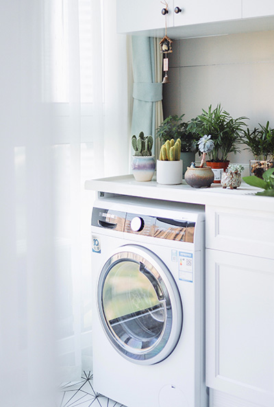 tumble dryer with bed sheets inside
