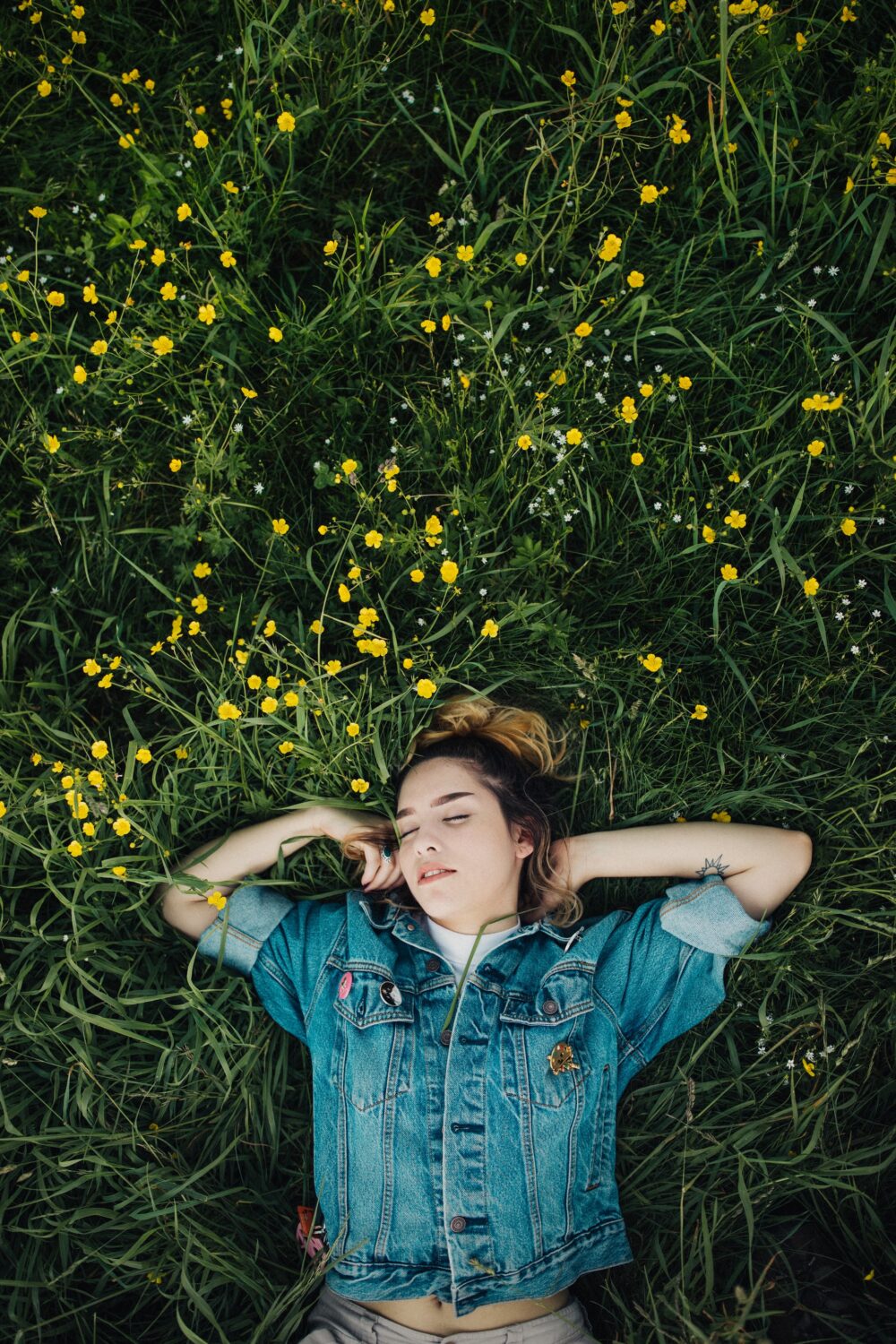woman asleep in field
